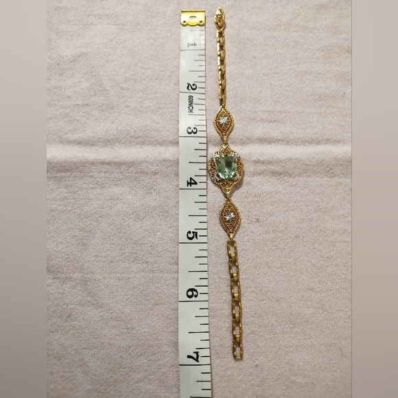 Elegant Gold tone Bracelet with Green Gemstone - Picture 2 of 3